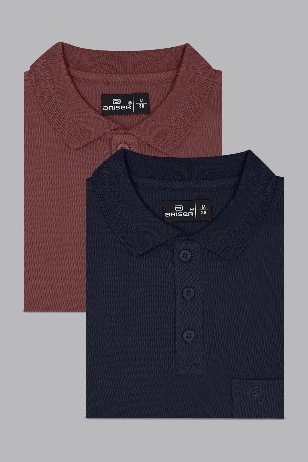 Two folded polo shirts, one brown and one black, on a gray background.