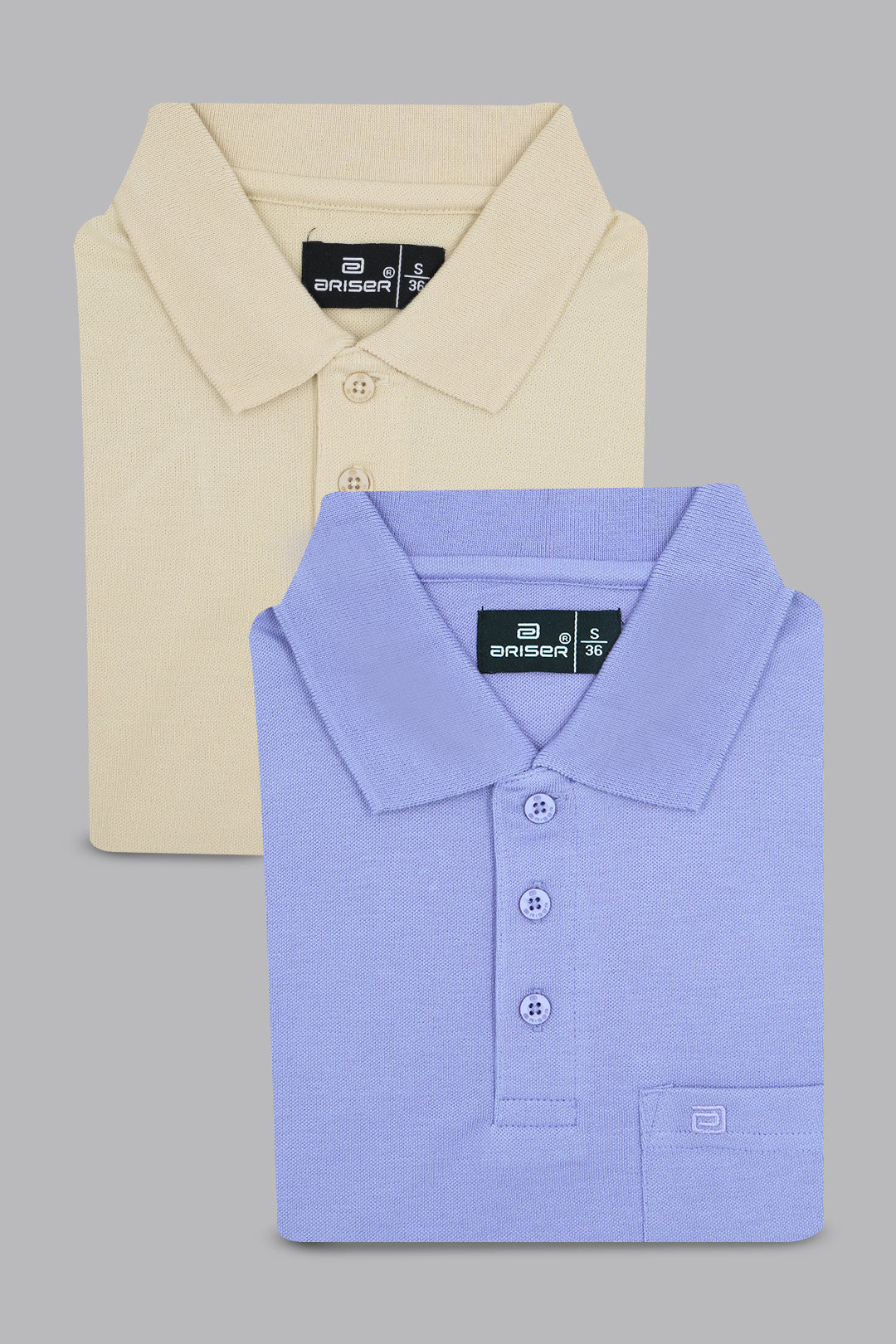 Two polo shirts, one beige and one blue, with Wrangler branding on a gray background.