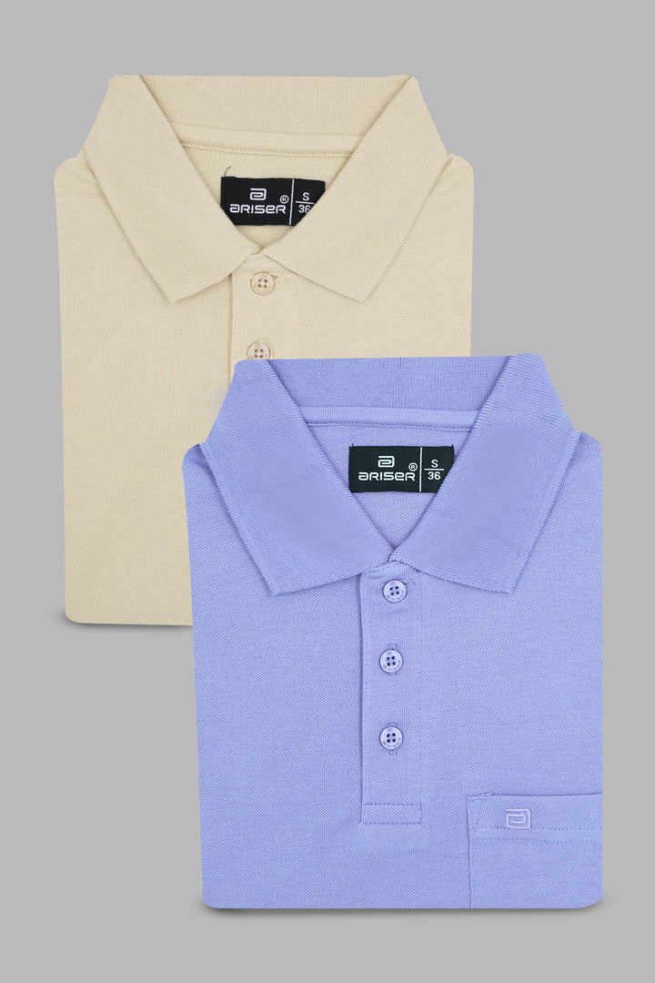 Two polo shirts, one beige and one blue, with Wrangler branding on a gray background.