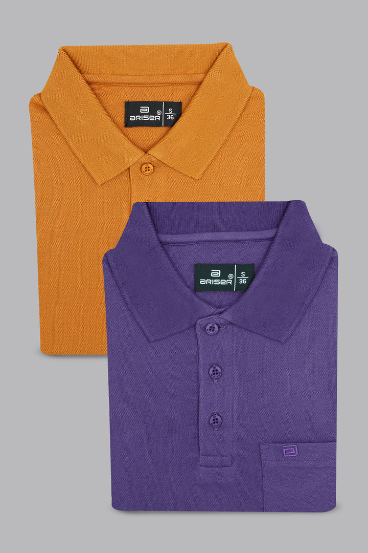 Two folded polo shirts, one orange and one purple, on a gray background.