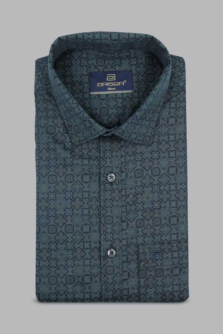 Folded blue patterned shirt with a ariser brand label on a gray background