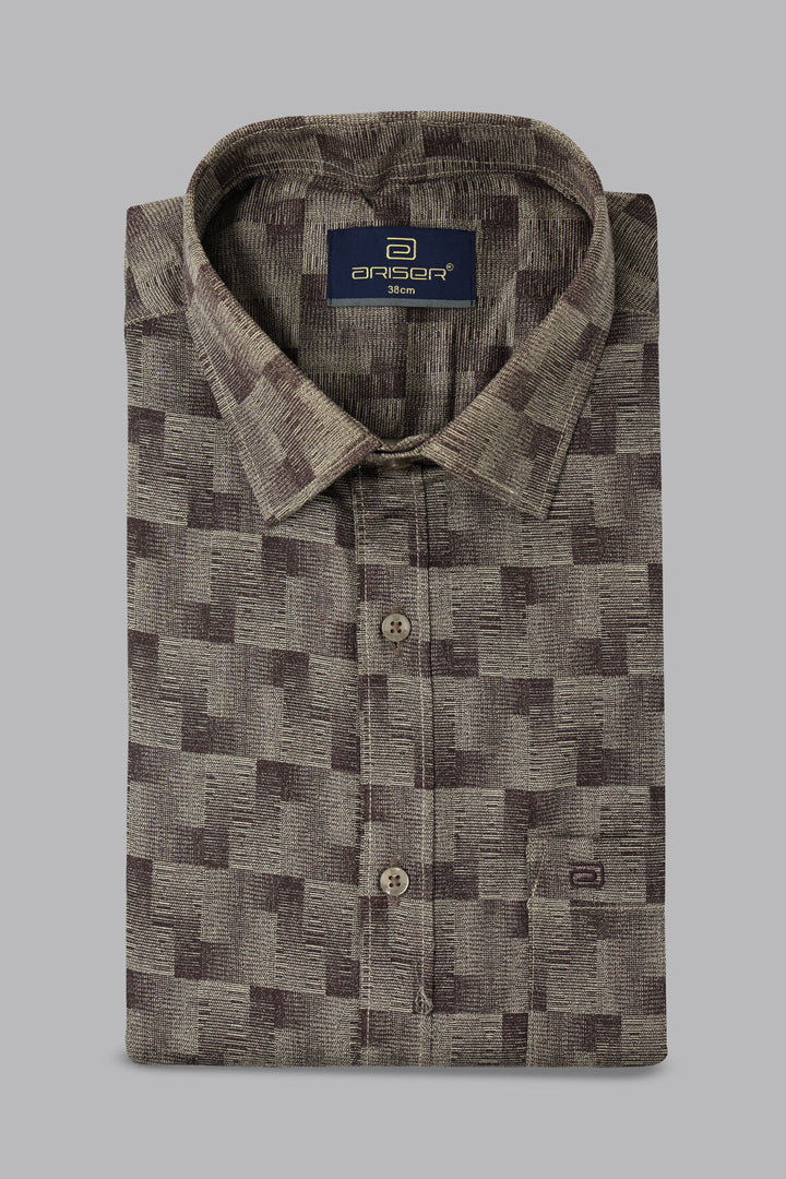 Patterned shirt with ariser brand label on a gray background