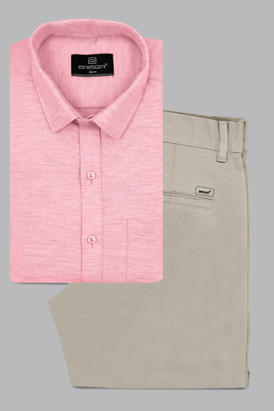 Pink dress shirt and beige pants with a brand label on a gray background