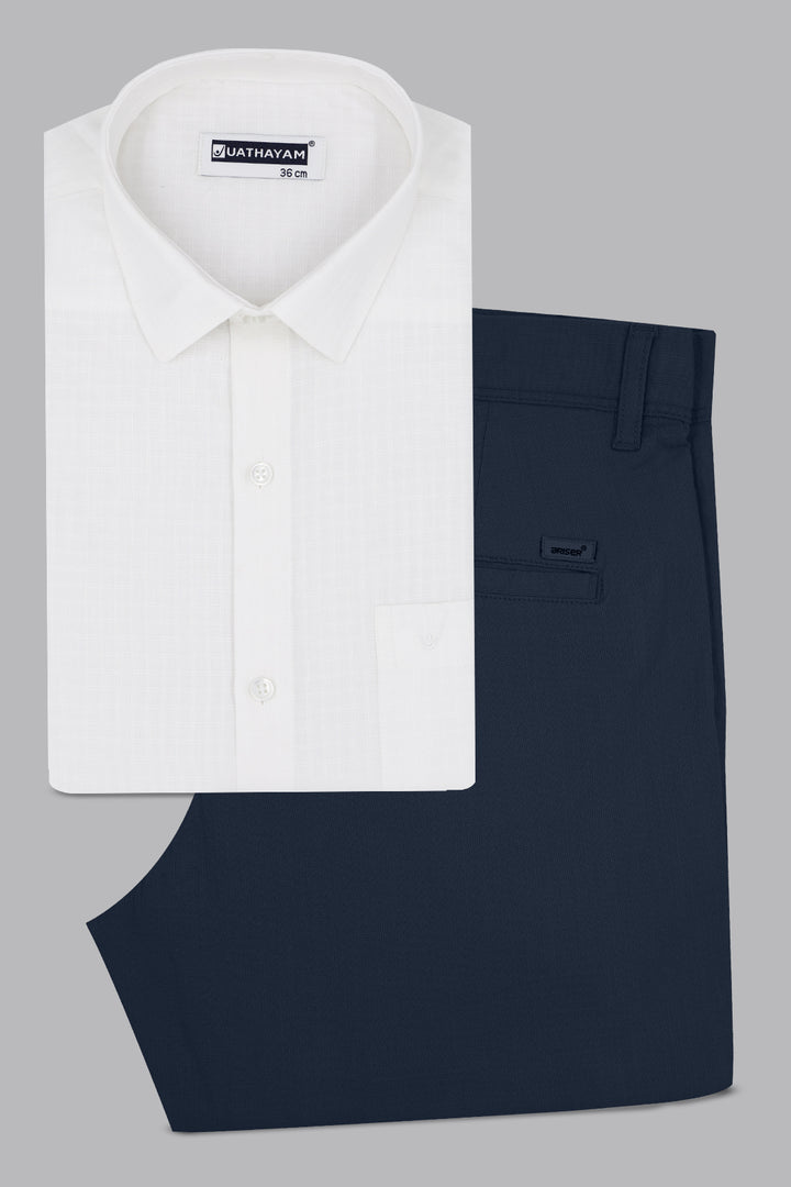 White dress shirt and navy pants on a gray background