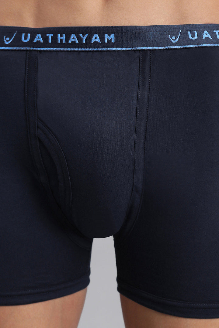 Ink blue men’s trunks with branded outer elastic waistband