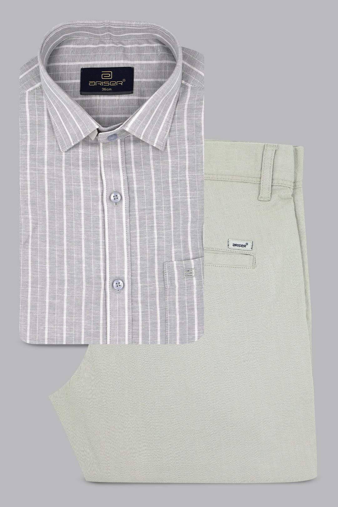Gray checkered shirt and light green pants on a gray background