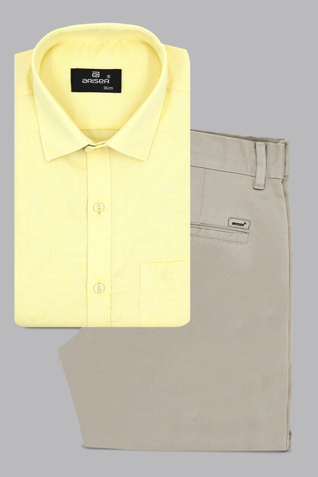 Yellow shirt and beige pants on a gray background