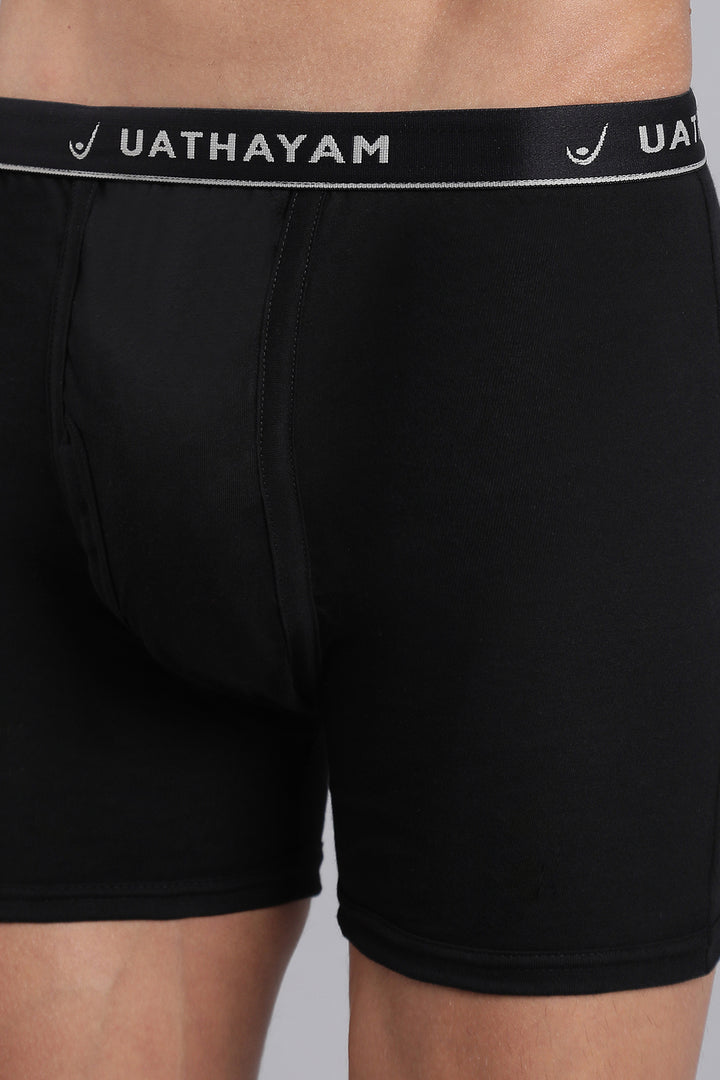 Chocolate brown men’s trunks with branded outer elastic waistband