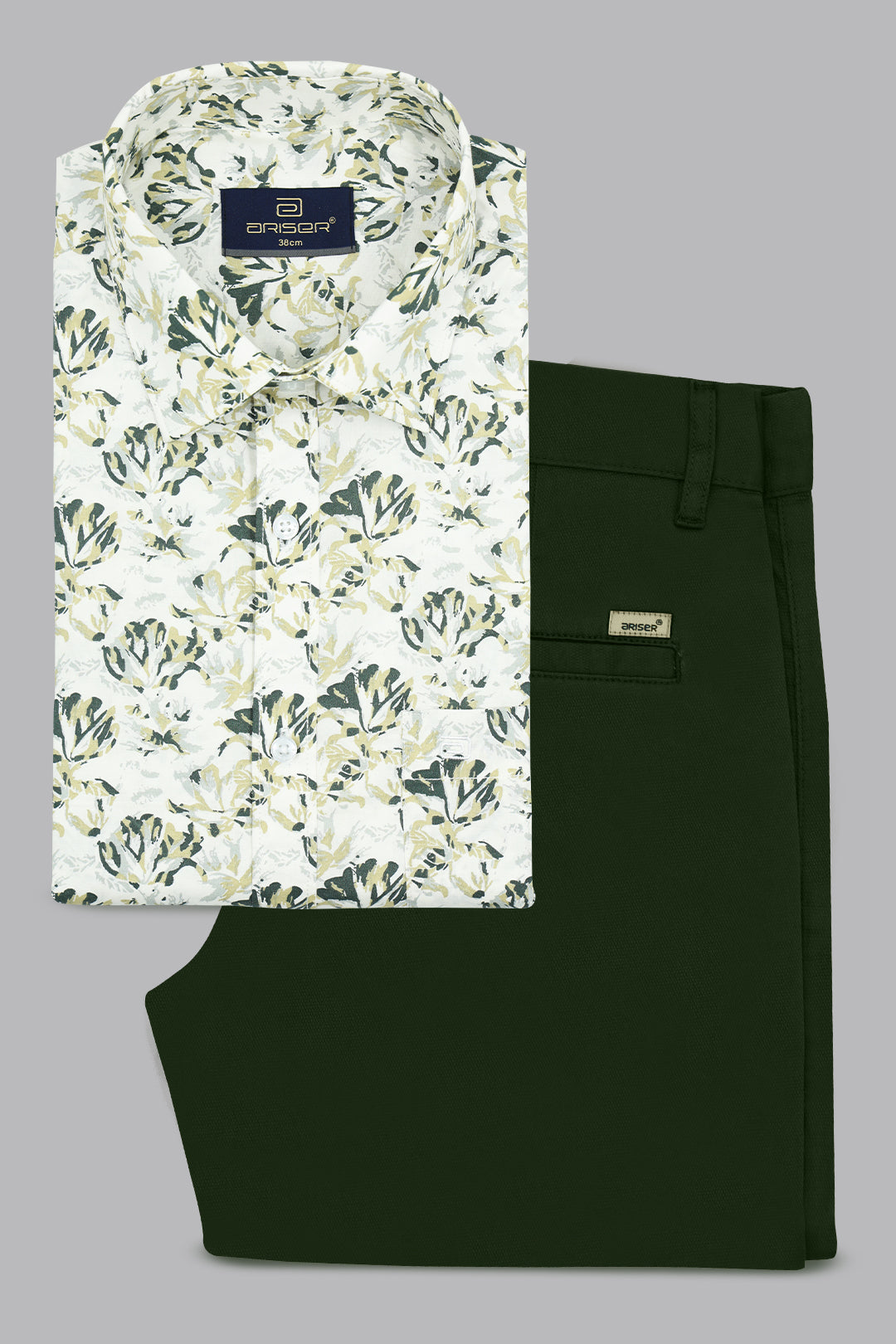 Floral shirt and dark green pants on a gray background