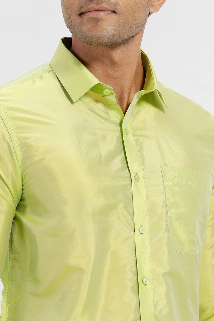 Pale green shirt and dhoti