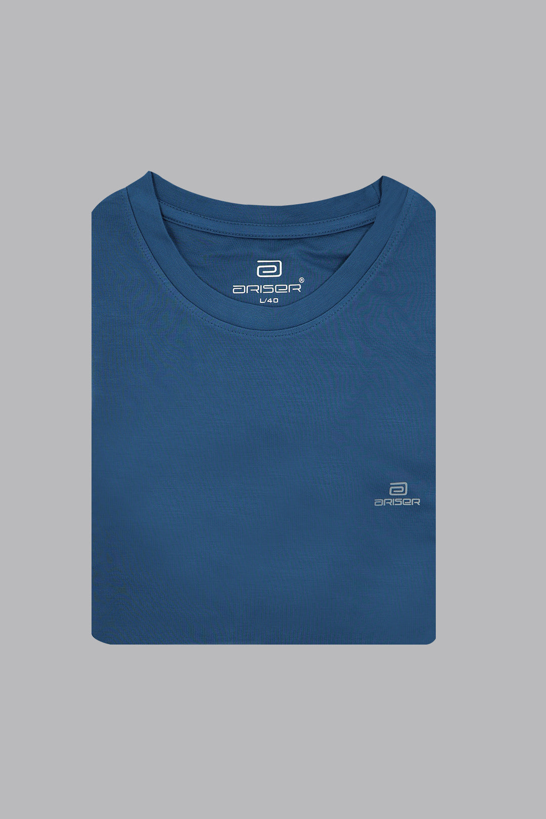 Folded blue t-shirt with a ariser brand logo on a gray background