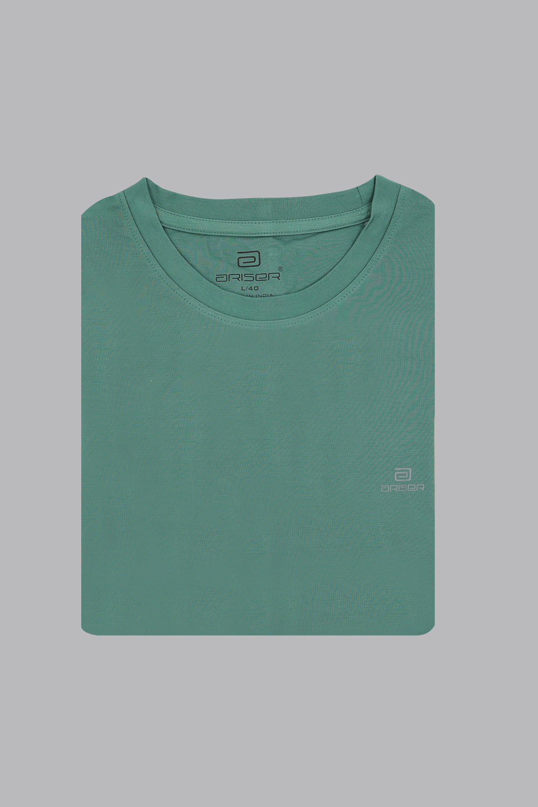 Green t-shirt with brand logos on a gray background