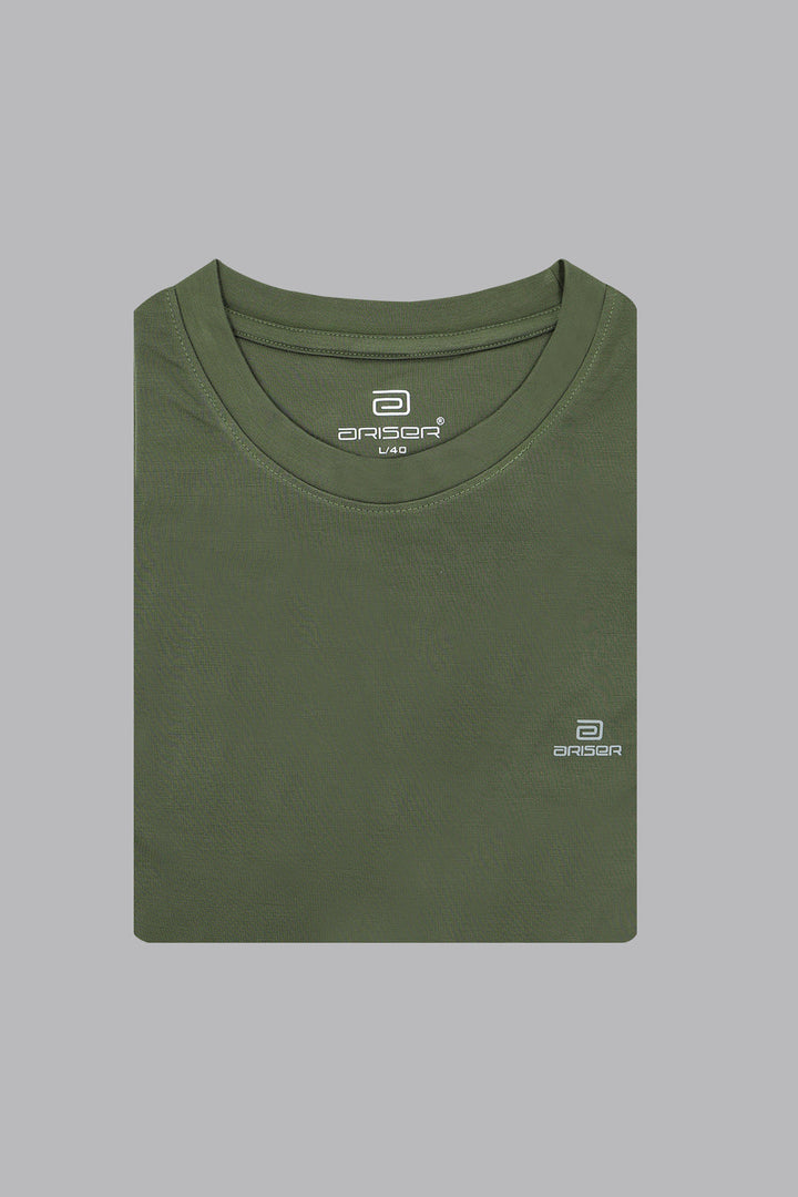 Folded green t-shirt with a ariser  brand logo on a gray background