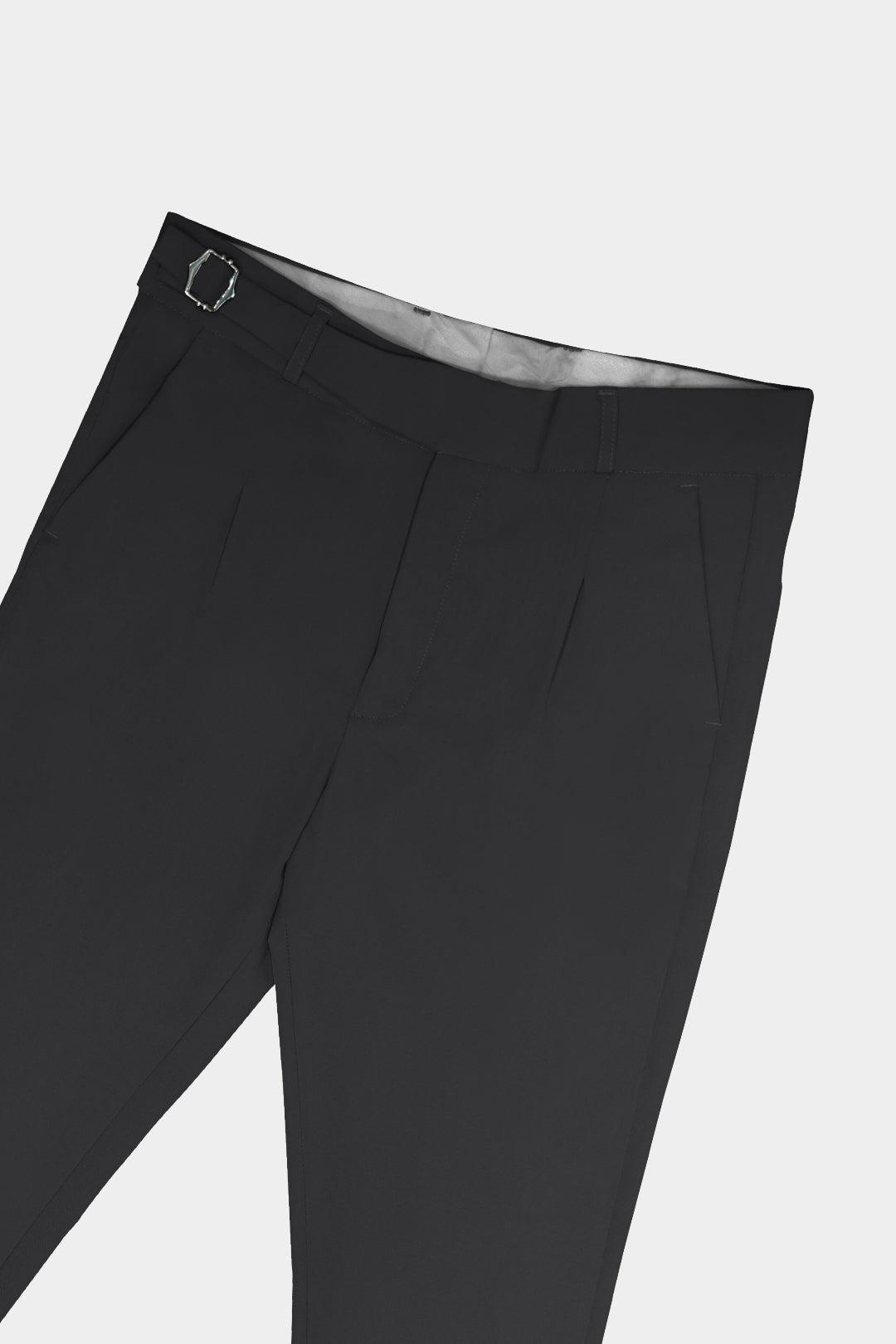 Black pants on a light gray background