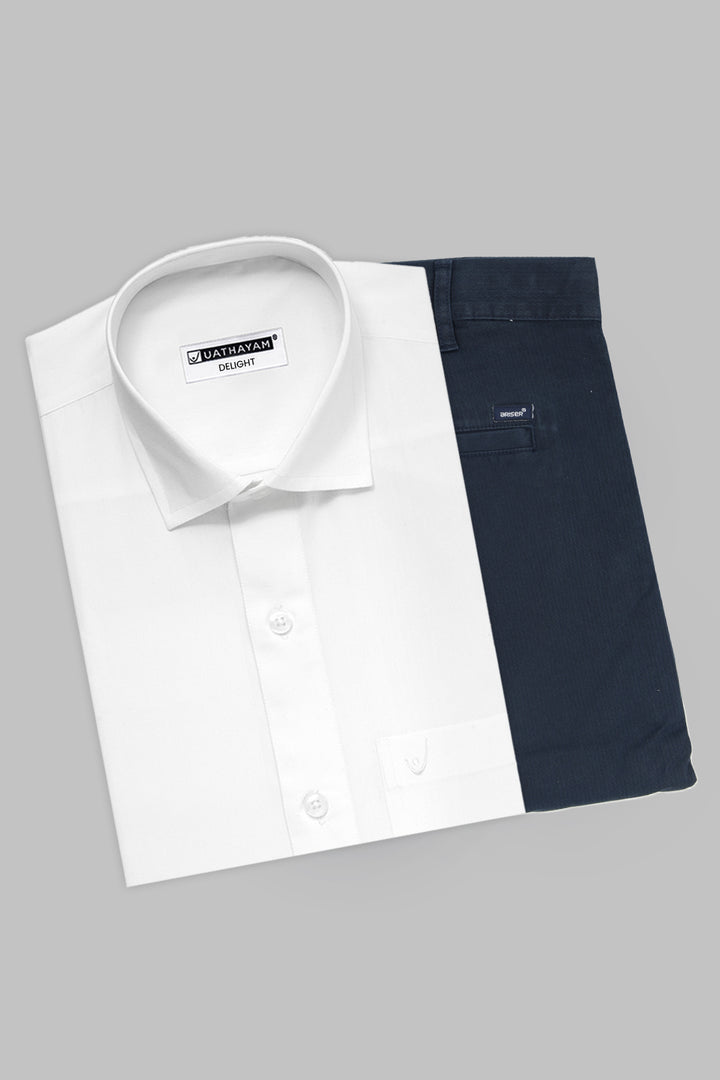 A folded white dress shirt with a pointed collar and button placket, layered over a folded navy blue pair of trousers, on a solid gray background.