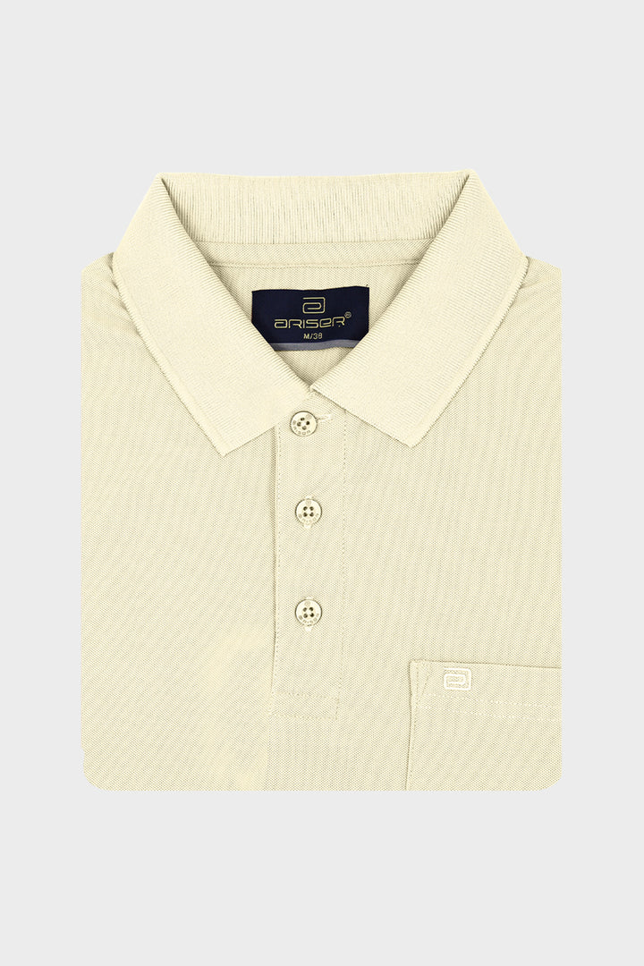 A folded cream-colored polo shirt with a subtle vertical stripe texture, featuring a classic collar, three-button placket, and a chest pocket with a small brand tab.