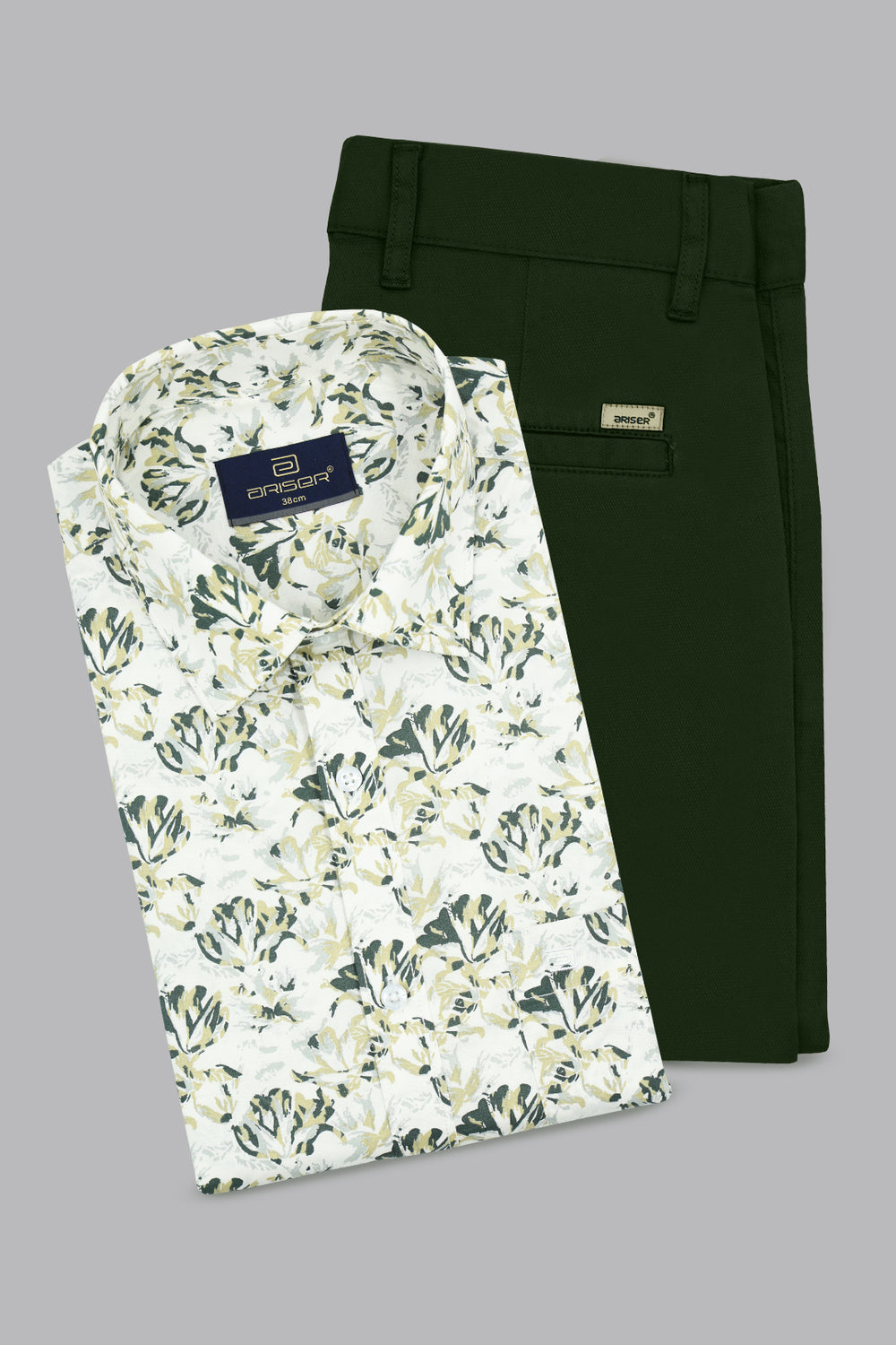 Floral shirt and dark pants on a gray background