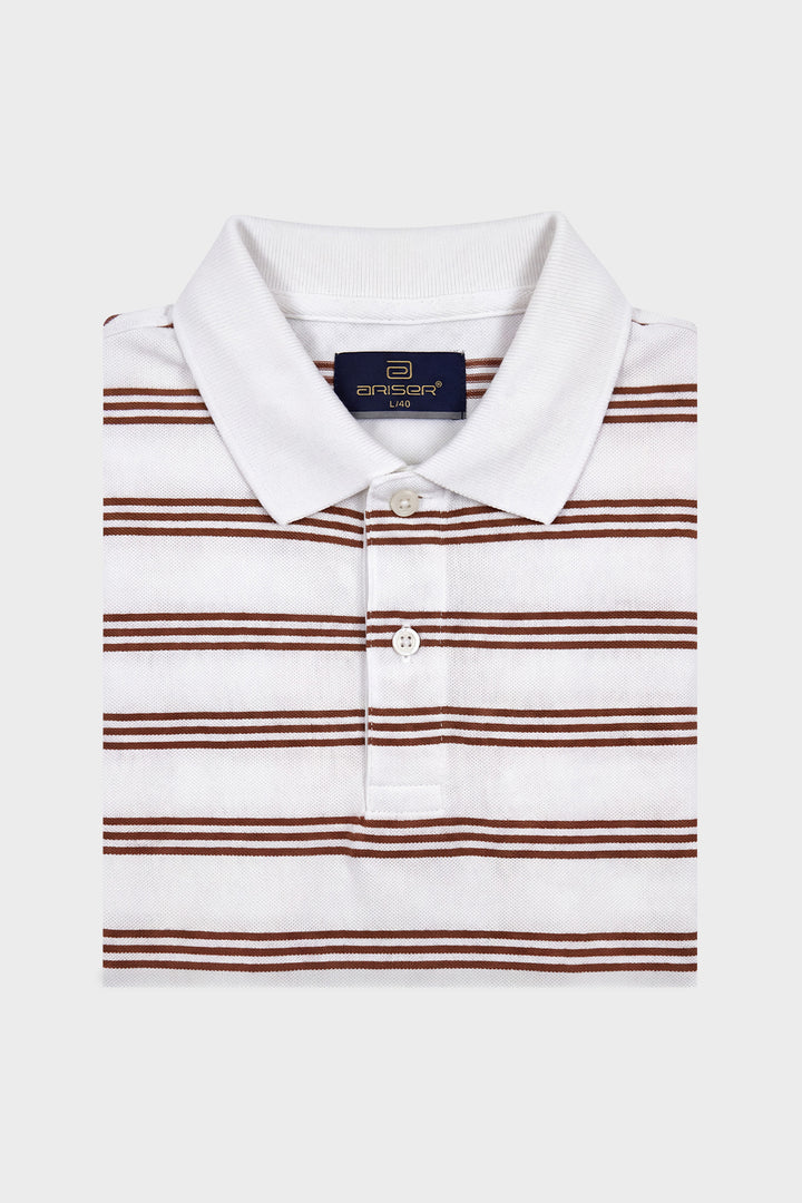A folded white polo shirt with thin brown horizontal stripes, featuring a classic collar and a three-button placket. The brand label 'enrico' is visible inside the collar.