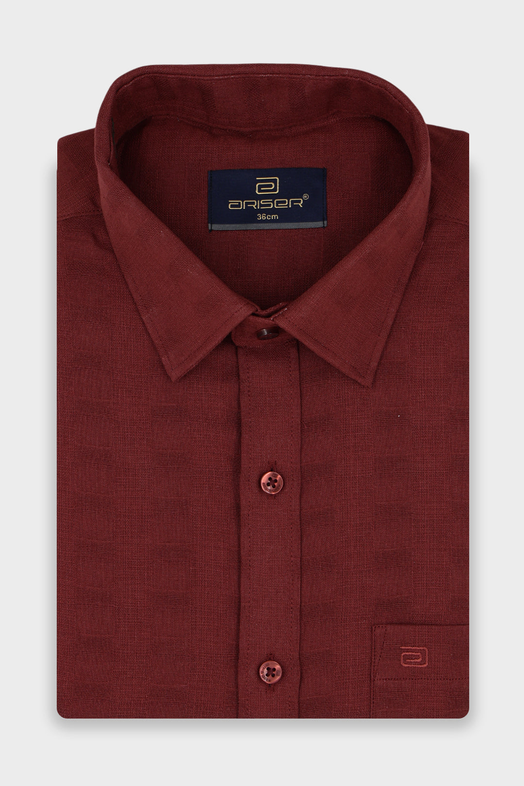 A Folded Brick Red Shirt.