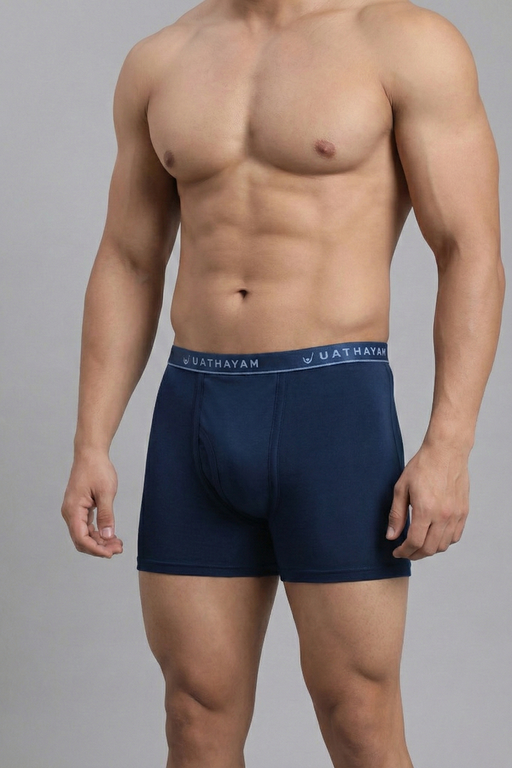 Classic navy blue men’s trunks with branded outer elastic waistband