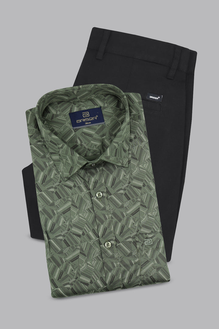 Green printed shirt and black pants with a brand label on a gray background