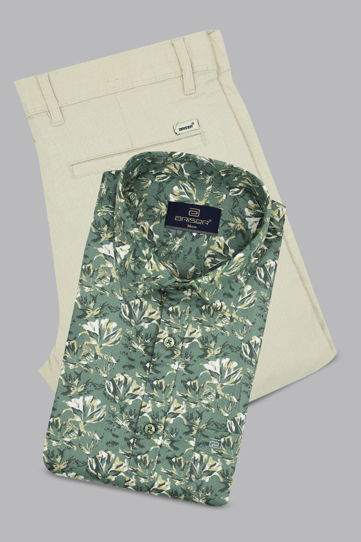 Men’s dusty olive green printed shirt paired with elegant cream trousers
