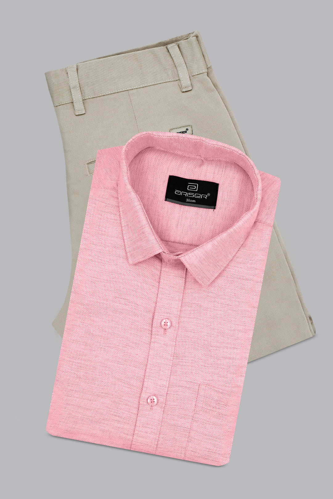 Pink dress shirt with a label on a gray background