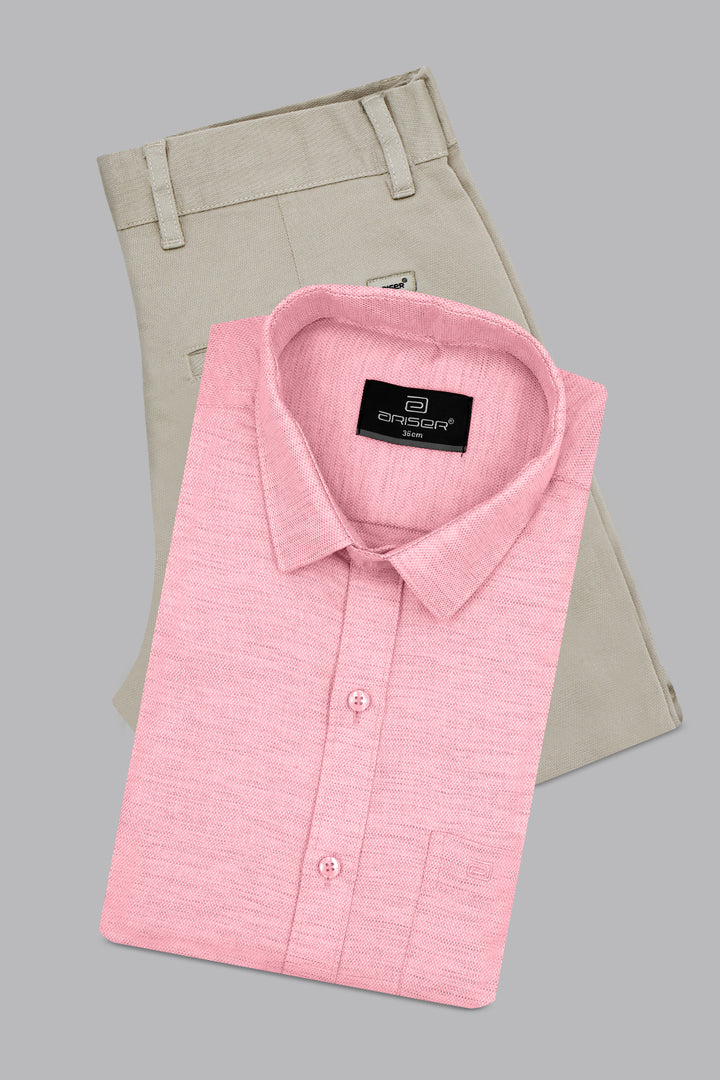 Pink dress shirt with a label on a gray background