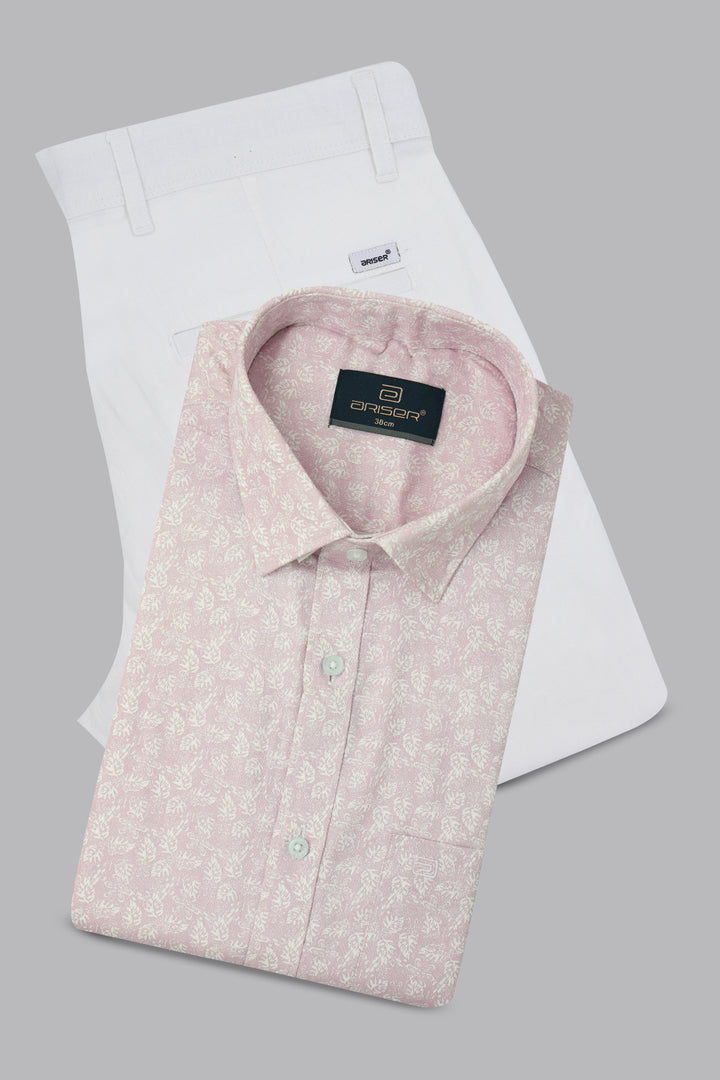 Folded pink shirt with a ariser label on a white background