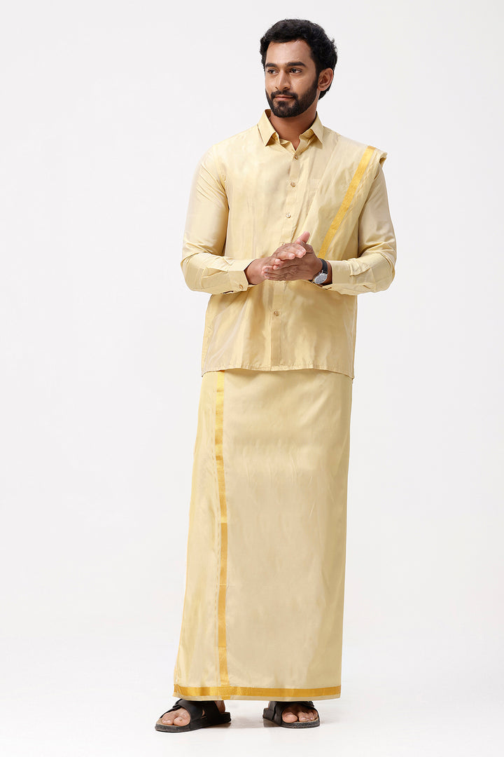 Man wearing a traditional beige outfit with yellow accents on a white background