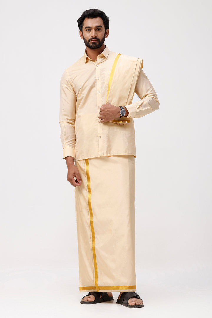 Man wearing a traditional cream-colored outfit with yellow accents on a white background