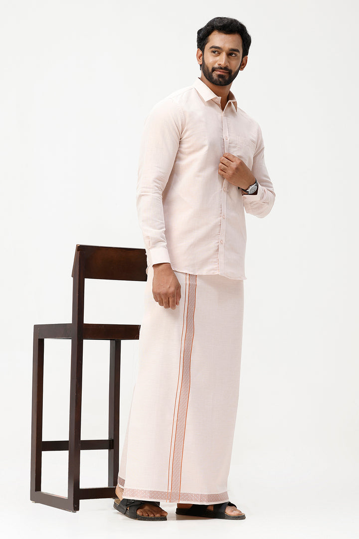 Man wearing a traditional Copper outfit with a wooden chair on a white background