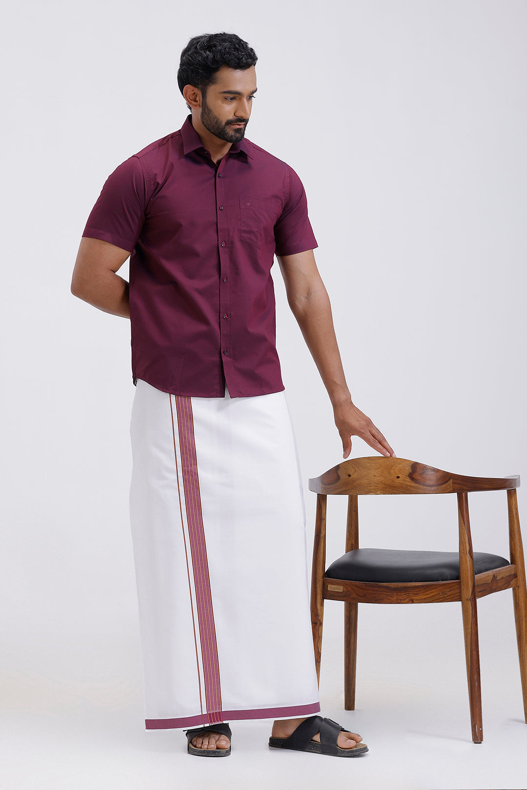 South Indian traditional wear plum red shirt and fancy border dhoti