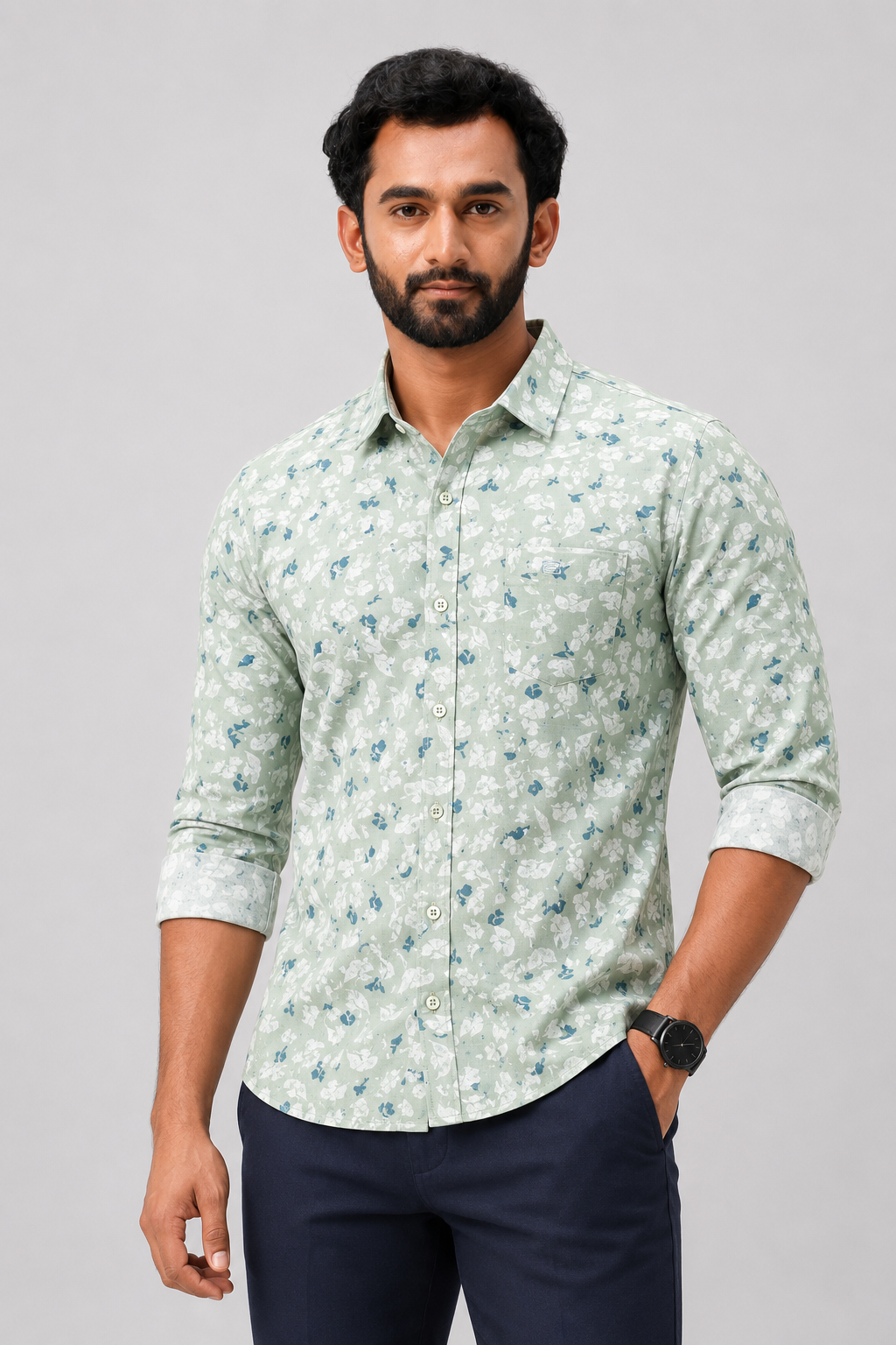 Green shirt with white floral pattern 